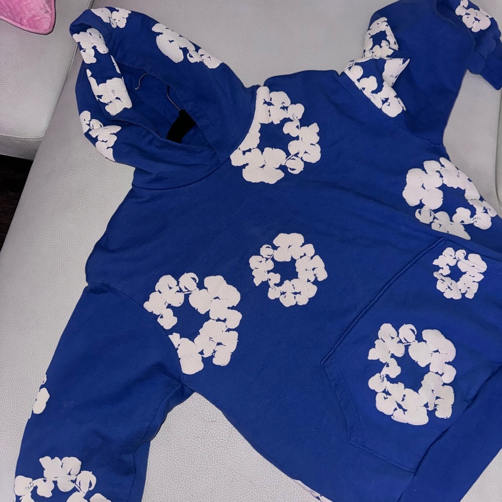 Denim Tears Blue Hoodie with White Patterns
